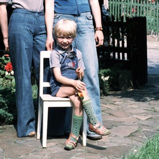 Family portrait in garden, mid-1980s style.