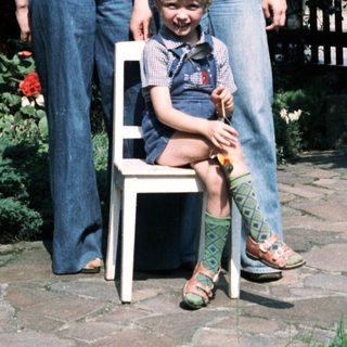 Family portrait in garden, mid-1980s style.