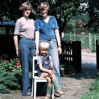 Family portrait in garden, mid-1980s style.
