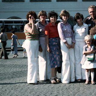 Family group photo from the 1980s outdoors.
