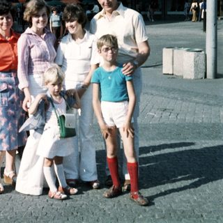 Family group photo from the 1980s outdoors.