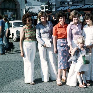 Family group photo from the 1980s outdoors.