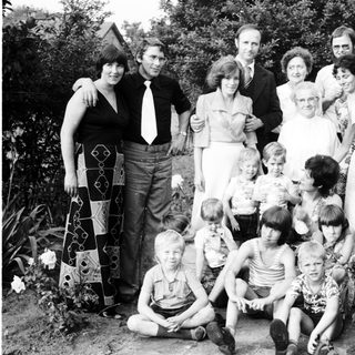 Family group photo from the late 20th century.