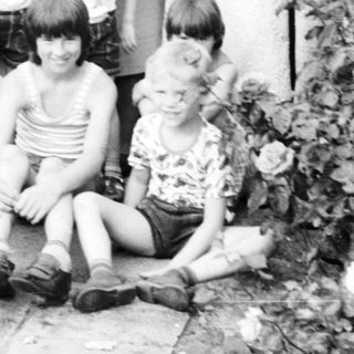 Family group photo from the 1970s or 1980s.