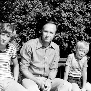 Family portrait outdoors in vintage style.