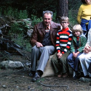 Family group photo in forested area, mid-1980s.