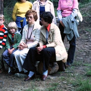 Family group photo in forested area, mid-1980s.
