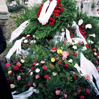 Elaborate funeral wreath on a grave.