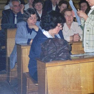 Group in a courtroom during a hearing.