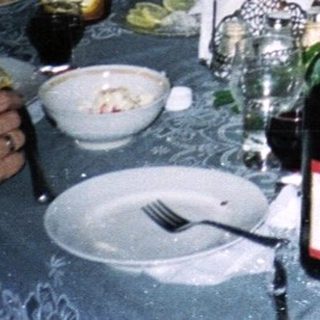Group gathered indoors for a social dinner.