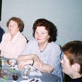 Group gathered indoors for a social dinner.