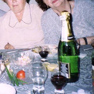 Family gathering at a celebratory dinner table.