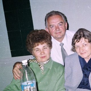 Family gathering at a celebratory dinner table.
