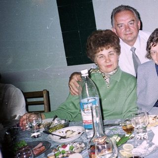 Family gathering at a celebratory dinner table.