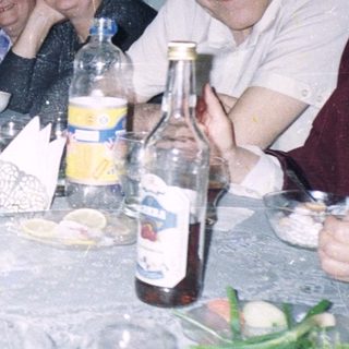 Group of people gathered for a meal together.