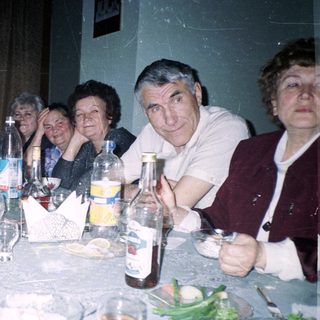 Group of people gathered for a meal together.