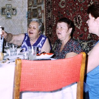Family gathering at a formal dining table.
