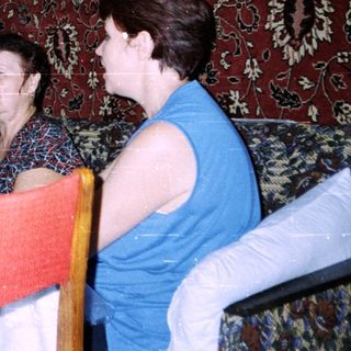 Family gathering at a formal dining table.