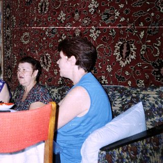 Family gathering at a formal dining table.