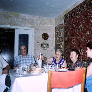 Family gathering at a formal dining table.
