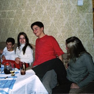 Group gathering at a casual indoor meal.