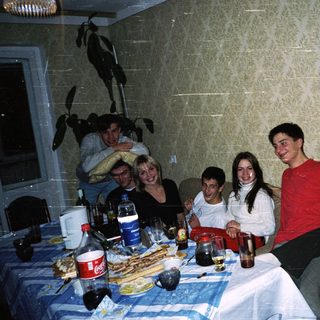 Group gathering at a casual indoor meal.