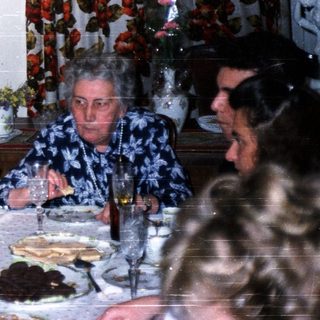 Family gathering at a festive dinner table.