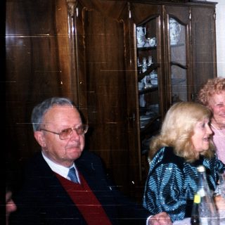 Family gathering at a festive dinner table.