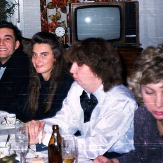 Family gathering at a festive dinner party.