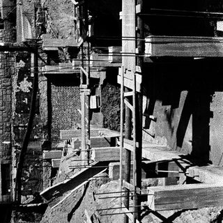 Construction site with a bridge under development, aerial view.