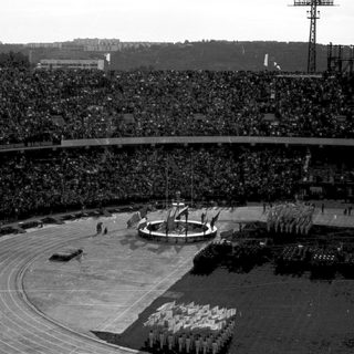Large crowd attends an event at a stadium.