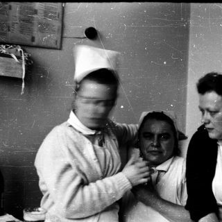 Medical examination or treatment in a clinical setting.
