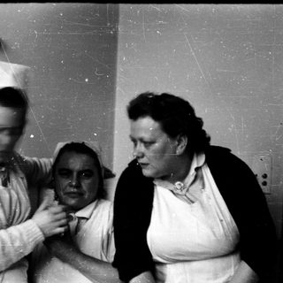 Medical examination or treatment in a clinical setting.