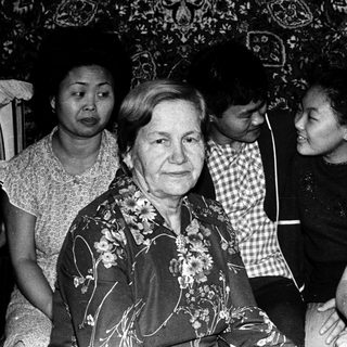 Group of people posing indoors, likely during an event.