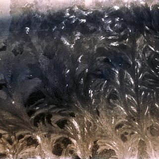 Rugged, textured volcanic rock formations.