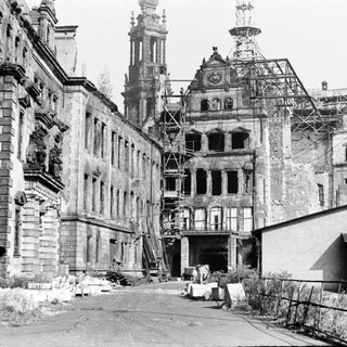 War-damaged historic buildings under reconstruction.