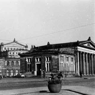 Neoclassical building facade, likely a historic theater or opera house.