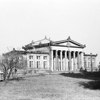 Neoclassical building with columns, likely institutional.