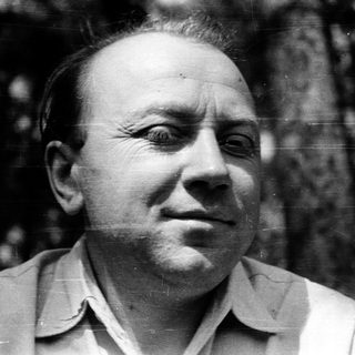 Man in vintage photograph wearing light shirt.