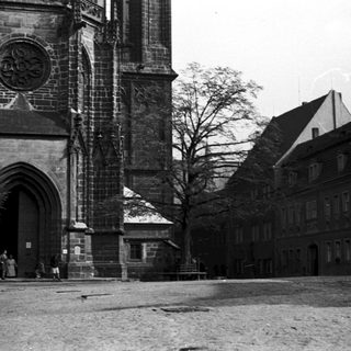 Historic Gothic cathedral with medieval architecture and courtyard.