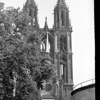 Gothic cathedral with twin spires and intricate stonework.