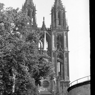Gothic cathedral with twin spires and intricate stonework.