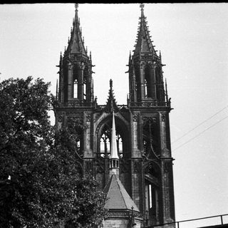 Gothic church spires with pointed towers.