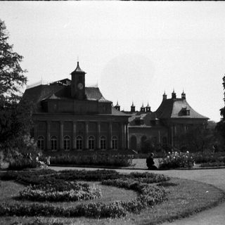 Grand historic mansion with formal gardens.