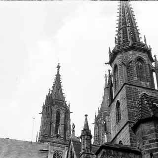 Gothic cathedral spires and detailed stonework.