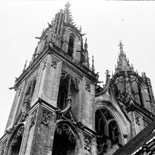 Gothic cathedral spires with intricate stone detailing.