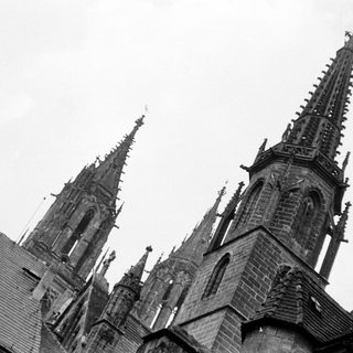 Gothic cathedral spires with intricate stone detailing.
