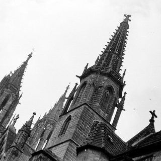 Gothic cathedral spires with intricate stone detailing.