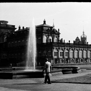 Grand palace courtyard with historic fountain.