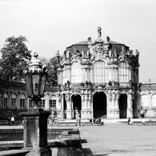 Baroque-style palace entrance with ornate architecture.